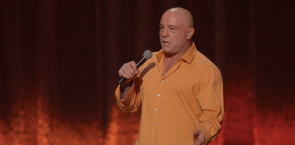 Joe Rogan Slams Covid Vaccines Mocks Trans People In Live Netflix Special Burn The Boats