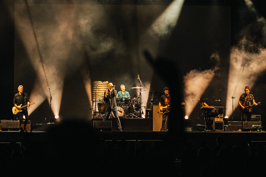 Image of Midnight Oil performing at the 2021 edition of WOMADelaide