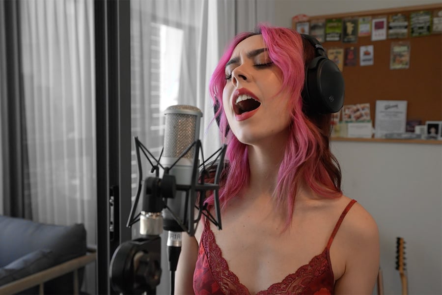 Mikaila Delgado of Yours Truly wears the Yamaha YH-E700A wireless headphones