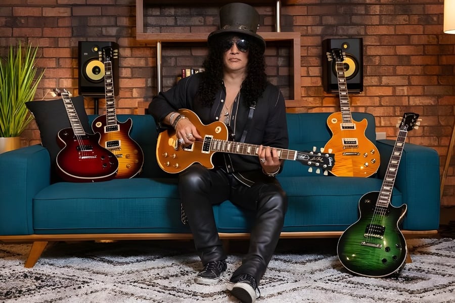 Three Rock icons: Slash, Gibson guitars and KRK monitors