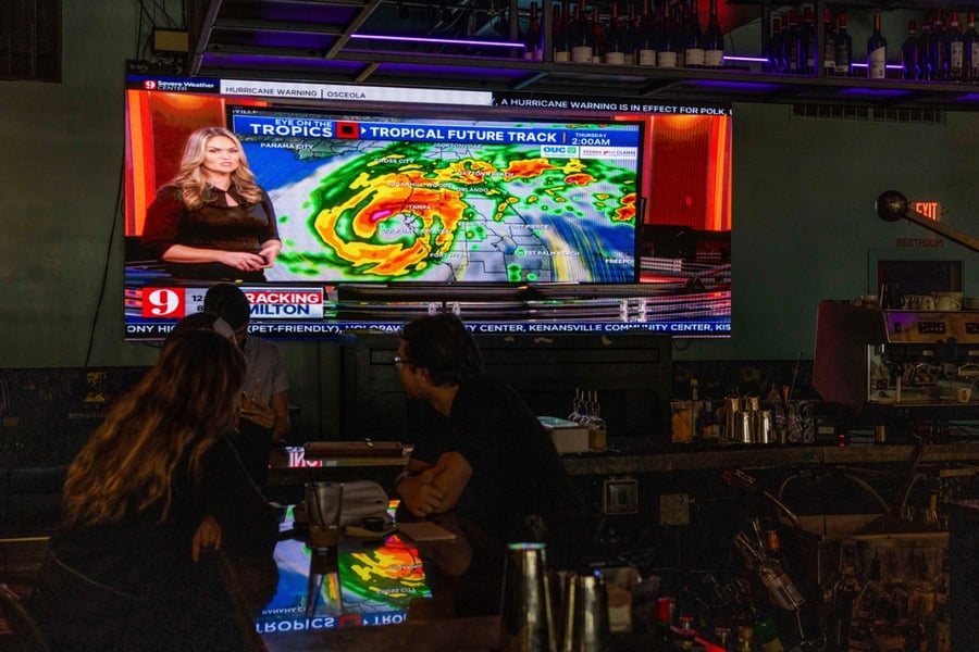 Local news weather report on a TV