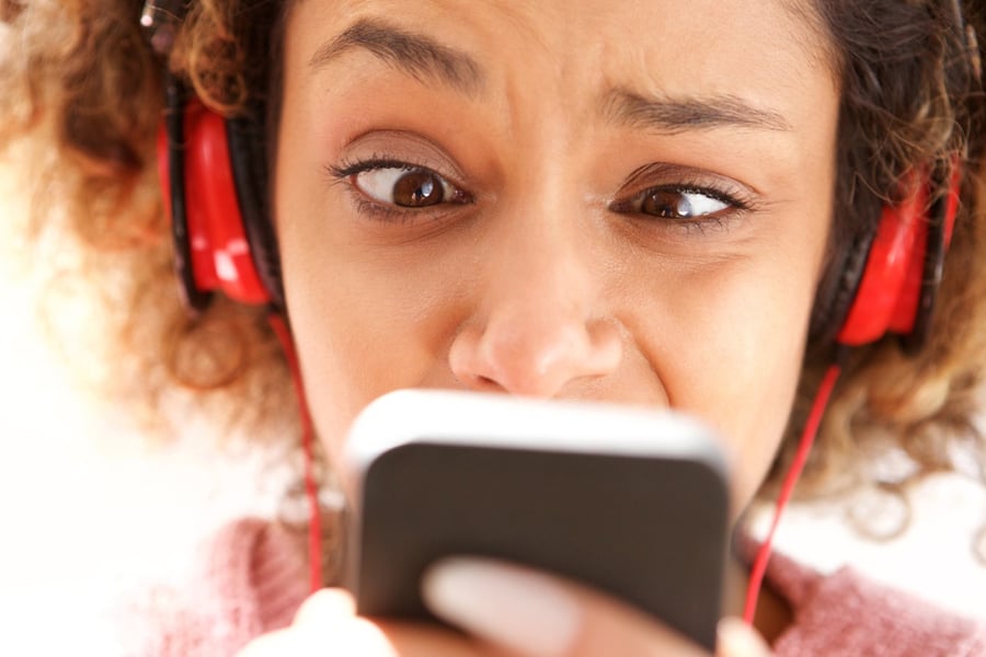 Woman looks at phone