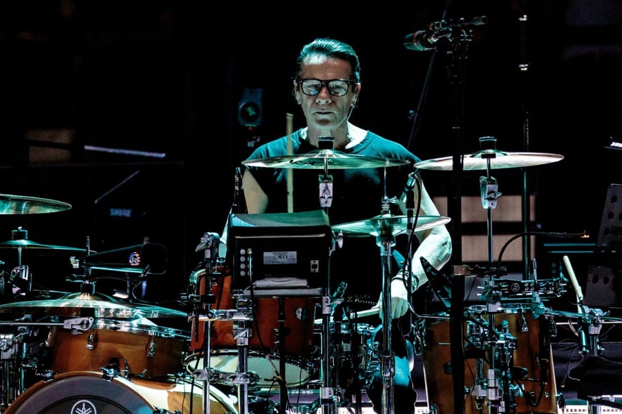 Larry Mullen Jr. performing with U2 in 2018