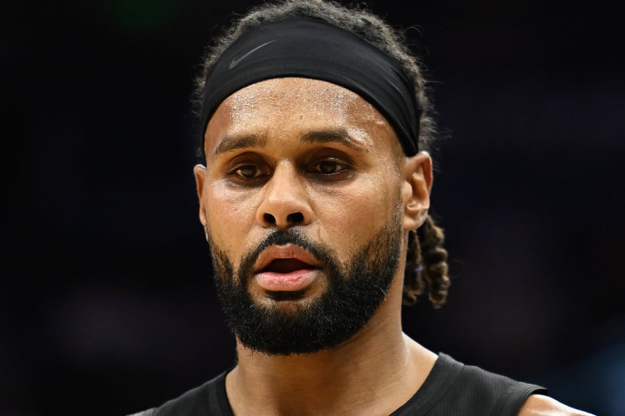 Patty Mills #8 of the Utah Jazz looks on during the first half of a game against the Sacramento Kings at Delta Center on October 29, 2024 in Salt Lake City, Utah. NOTE TO USER: User expressly acknowledges and agrees that, by downloading and or using this photograph, User is consenting to the terms and conditions of the Getty Images License Agreement. (Photo by Alex Goodlett/Getty Images)