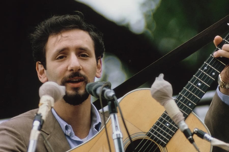Peter Yarrow performing at the Newport Folk Festival in 1964. Photo credit: Gai Terrell/Redferns/Getty Images