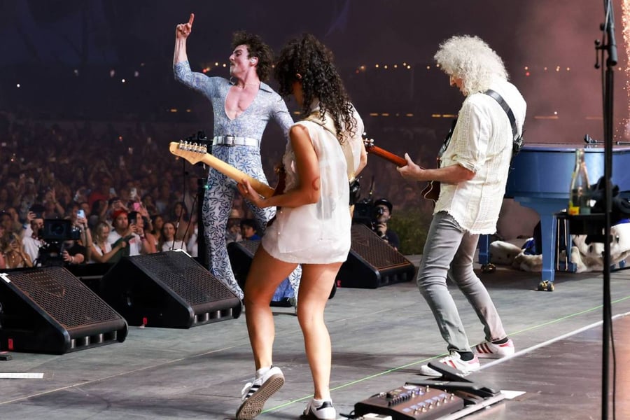 Brian May (R) performs with Benson Boone (L) at the Coachella Stage
