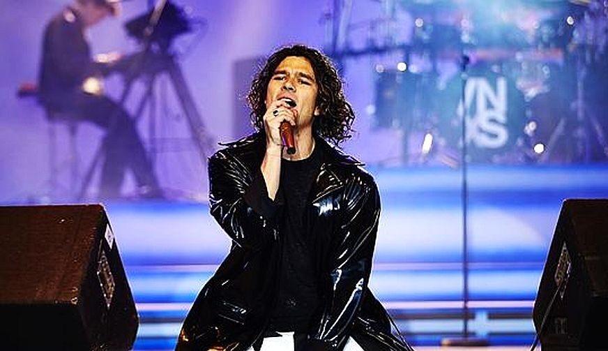 Luke Arnold portraying INXS frontman Michael Hutchence