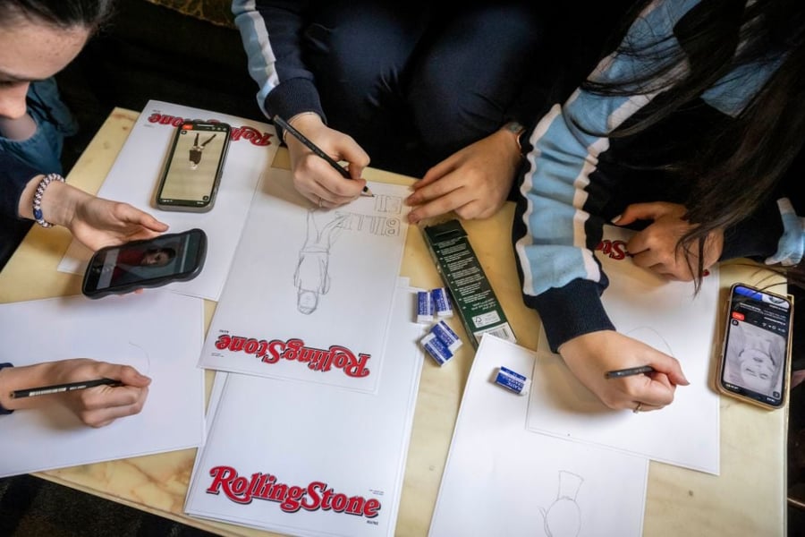Students work around a table