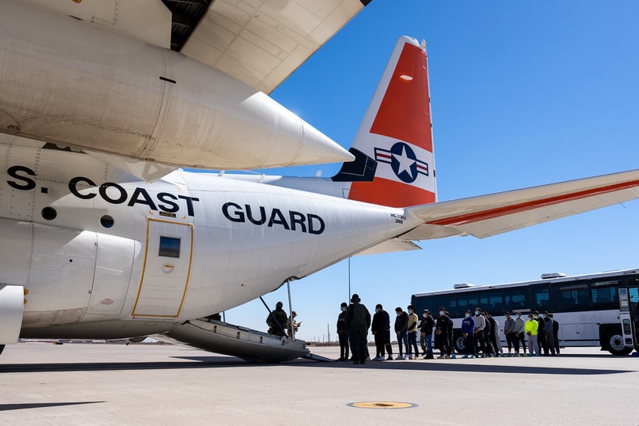 US Coast Guard C-130 Hercules crew prepares for an immigrant expulsion flight in El Paso, California