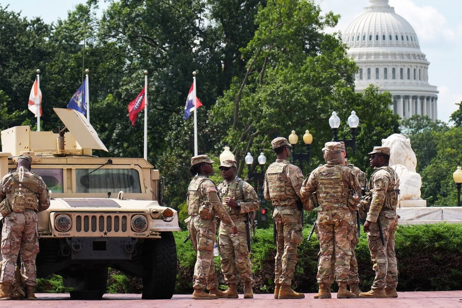 Members of the National Guard stand by at Union Station in Washington, D.C.