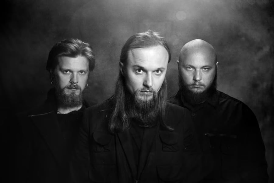 A black and white photo of Molchat Doma's Egor Shkutko; Roman Komogortsev; Pavel Kozlov