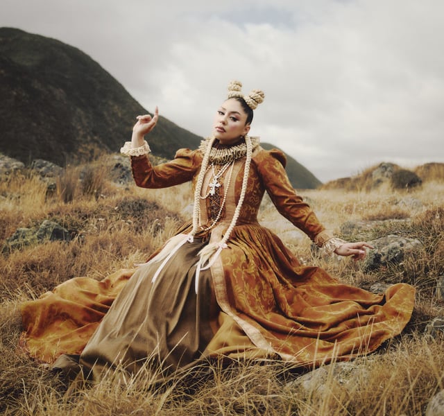 Theia Girl, in a Savage World album cover