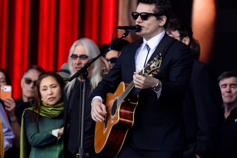 John Mayer sings during a public memorial for Grateful Dead co-founder Bob Weir