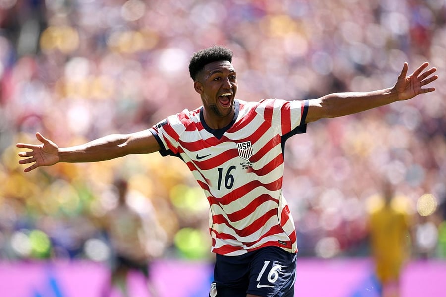 Alex Freeman of the USA scores against Australia at the World Cup